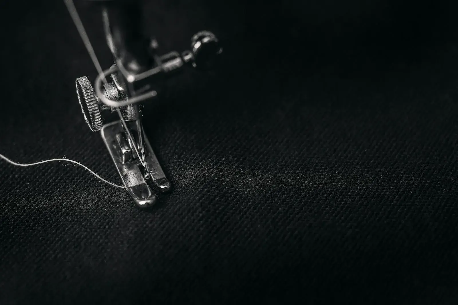 Sewing machine stitching a seam