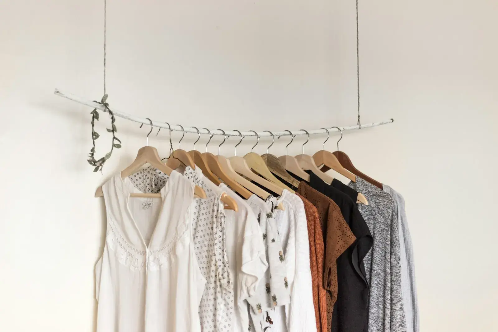 Garments on wooden hangers