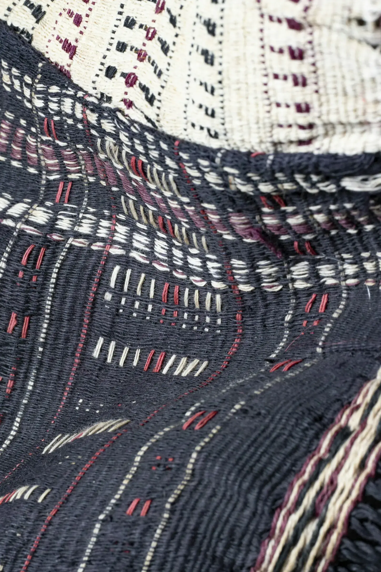 Hand-stitched fabric close-up