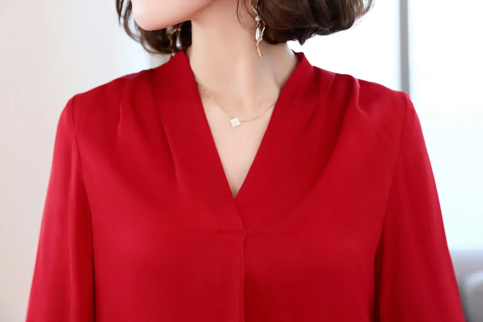 Red V-neck top